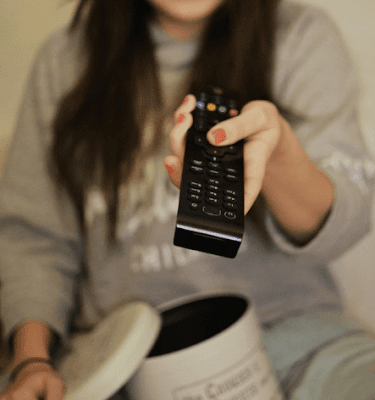 woman using remote