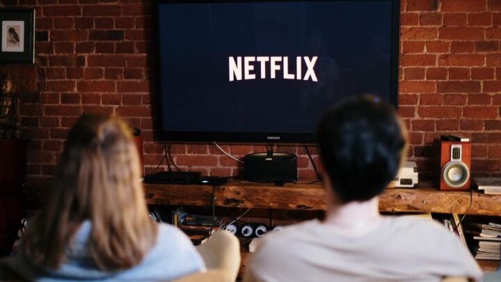 Man and Woman watching Netflix