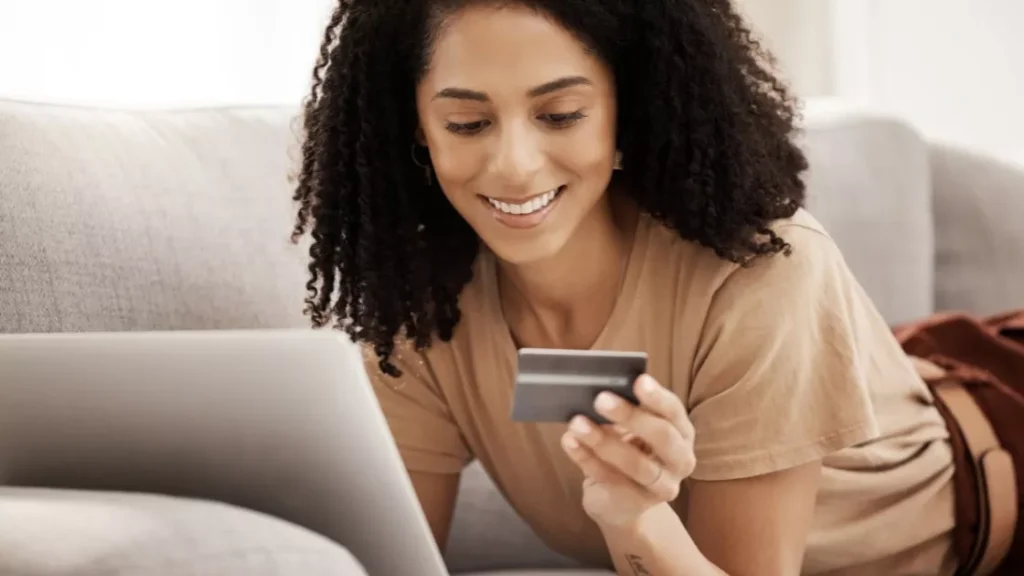 A woman making an online payment with a credit card